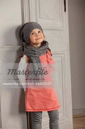 Smiling girl wearing hat and scarf