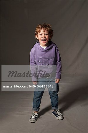 Boy smiling in studio