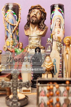 Religious icons and crosses on table