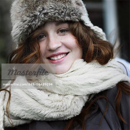 Smiling woman wearing hat and scarf