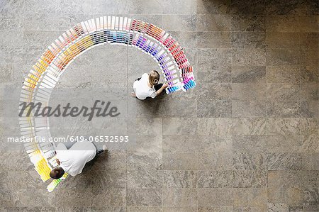 Business people examining paint swatches