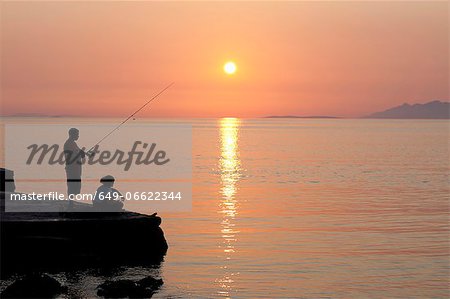 Man on Fishing Pier stock image. Image of sunset, harvey - 269720267