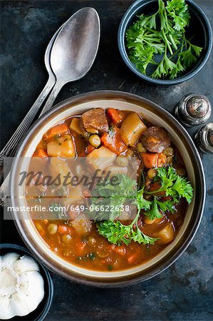 Bowl of stew with herbs Bowl of stew with herbs