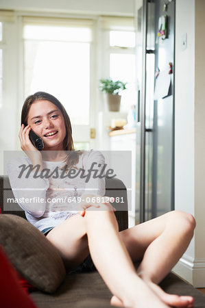 Teenage girl on cordless phone