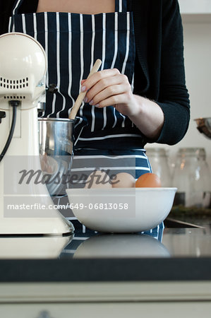 Woman stirring cake mixture