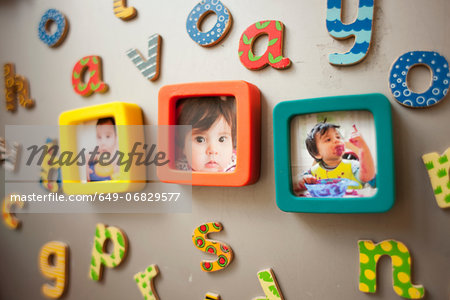 Childhood photographs and picture on wall