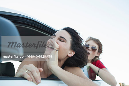 Woman shouting through car window