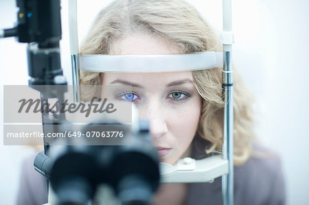Young woman having eye examination
