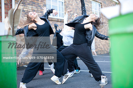 Group of girls dancing in carpark