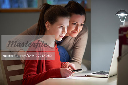 Girl using laptop computer