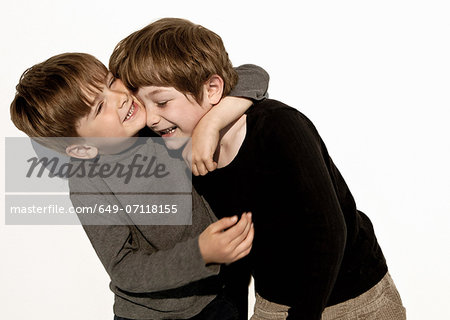 Brothers play fighting Brothers play fighting