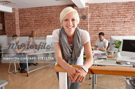 Portrait of mid adult woman in creative office