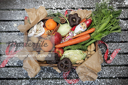 Unwrapped box of savoury and sweet christmas food Unwrapped box of savoury and sweet christmas food
