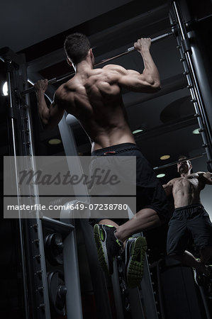 Man doing chin-ups