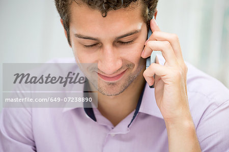 Young man on mobile phone