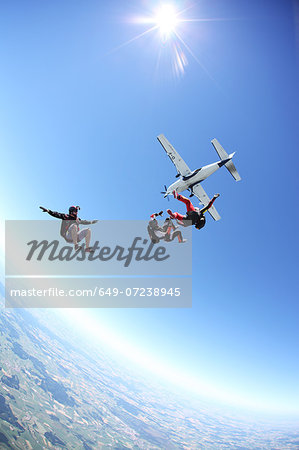 Skydivers free falling above Leutkirch, Bavaria, Germany Skydivers free falling above Leutkirch, Bavaria, Germany