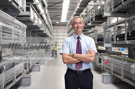 Portrait of manager in engineering warehouse