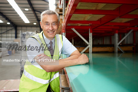 Portrait of warehouse manager in engineering warehouse