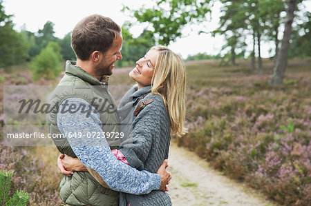 Mid adult couple hugging