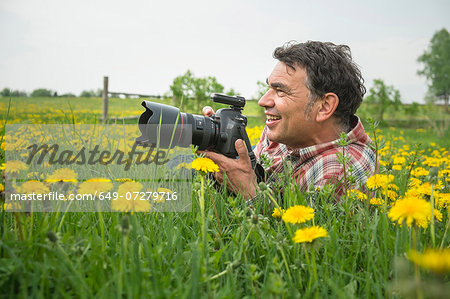 Photographer in field