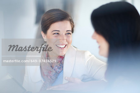 Businesswomen having conversation