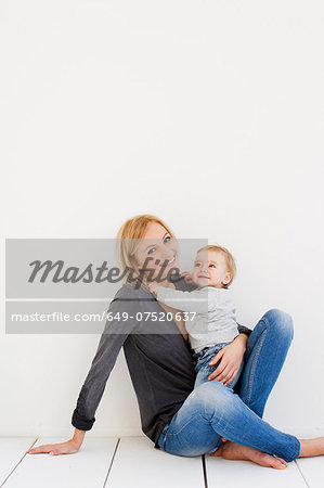 Studio portrait of mother and baby girl