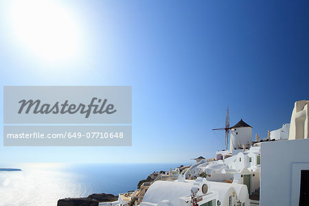 View of Oia town and windmill, Santorini, Cyclades Islands, Greece
