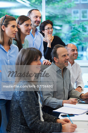 Businesspeople watching presentation