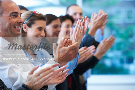 Group of people clapping