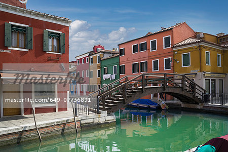 Multi colored houses and canal bridge, Burano, Venice, Veneto, Italy