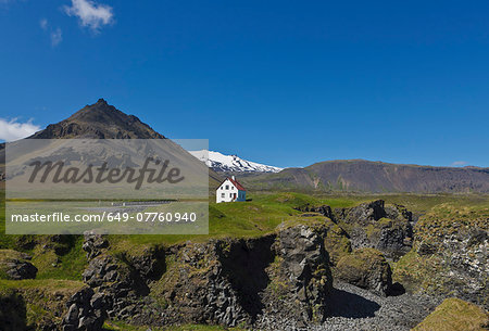 Cottage on landscape, Arnarstapi, Snaefellsnes, Iceland