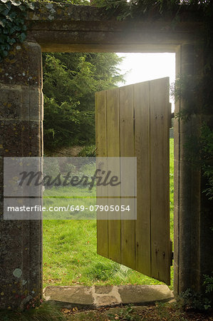 Open gate from walled garden