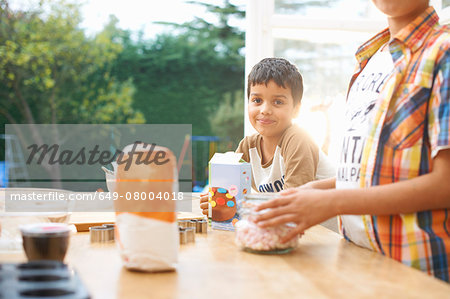 Children baking in kitchen