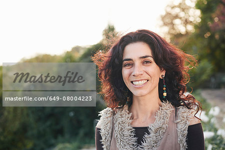 Portrait of mature hippy female in garden - Stock Photo - Masterfile -  Premium Royalty-Free, Code: 649-08004223