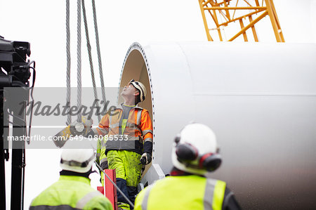 Engineers working on wind turbine