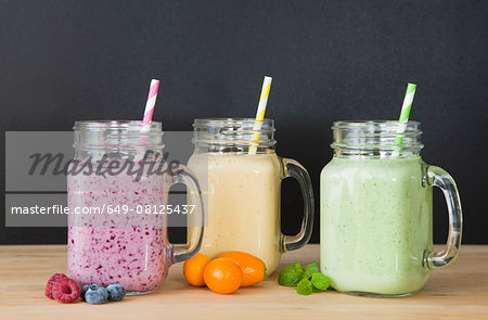 Still life of three fresh smoothies and fruit Still life of three fresh smoothies and fruit