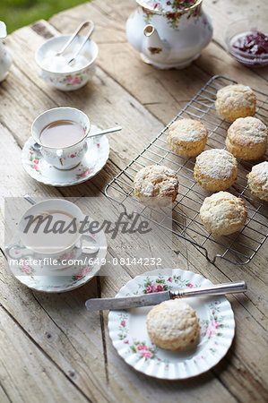 Table with fresh scones and afternoon tea
