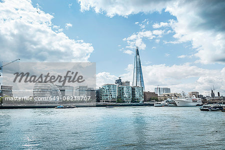 Waterfront cityscape of the Shard and Thames river, London, England, UK