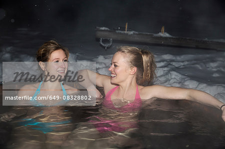 Young women enjoying hot tub