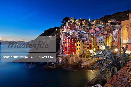 Waterfront town of Riomaggiore at night, Italy