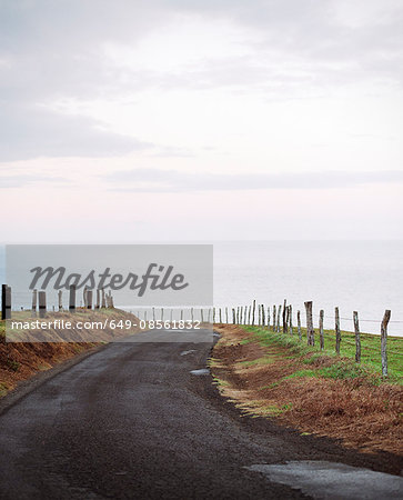 Paved road on rural cliff