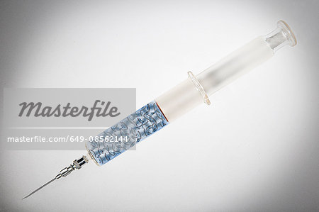 Baseballs in a syringe