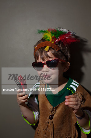 Boy dressed up in native american costume