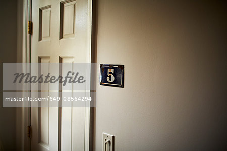 Apartment door with number 5