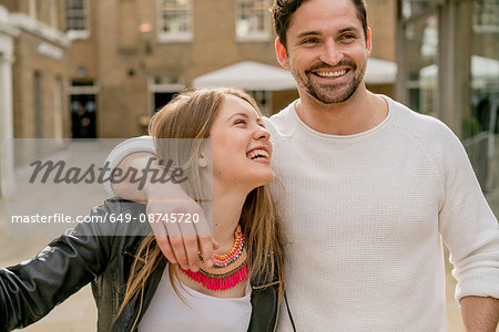 Happy young couple on Kings Road, London, UK