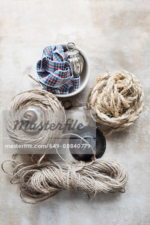 Overhead view of Christmas baubles with string