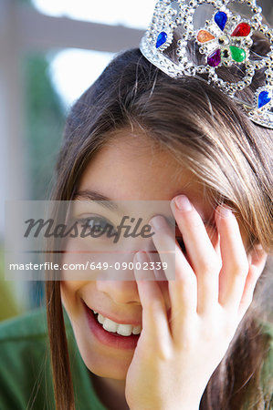 Girl wearing a crown, smiling