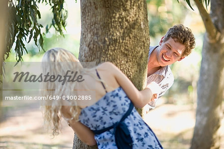 Couple playing together outdoors