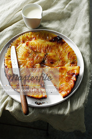 Plate of fruit tart with cream