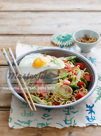 Bowl of chicken and egg with noodles